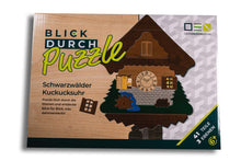 Laden Sie das Bild in den Galerie-Viewer, Blick-Durch-Puzzle: Schwarzwälder Kuckucksuhr Verpackung von oben