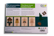 Laden Sie das Bild in den Galerie-Viewer, Blick-Durch-Puzzle: Schwarzwälder Kuckucksuhr Verpackung von unten