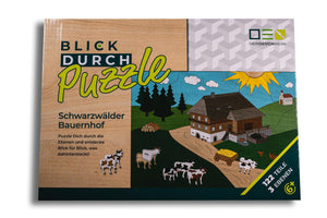 Blick-Durch-Puzzle: Schwarzwälder Bauernhof Verpackung von oben