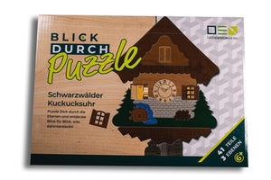 Blick-Durch-Puzzle: Schwarzwälder Kuckucksuhr Verpackung von oben